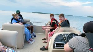 Young adults on a boat ride