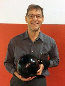 Man with bowling ball