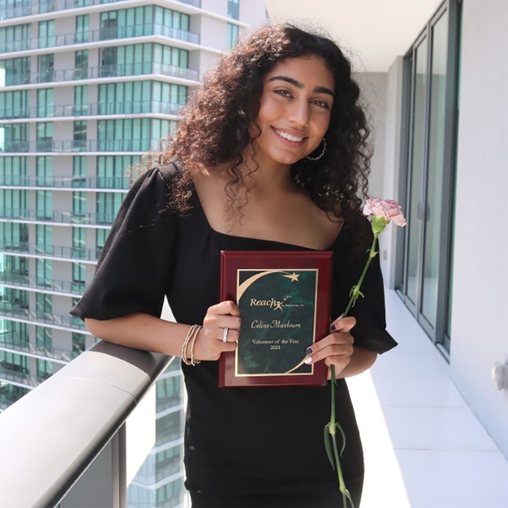 Celine with her award.