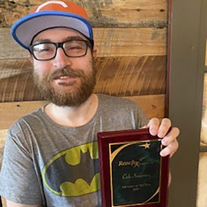 Cole with his award.
