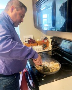 James cooking beef stroganoff.