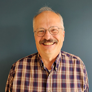 Doug - Small Doug volunteer with Reach for Resources.